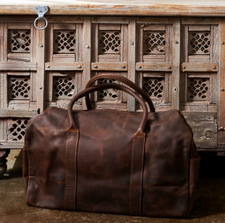 Zoe Leather Duffle Bag - Dark Brown, styled shot, duffle bag, duffle bag leather, travel bag, weekend bag, men's duffle bag, women's duffle bag, genuine leather, handmade bag, luxury bag, fashion, liamandlana.com