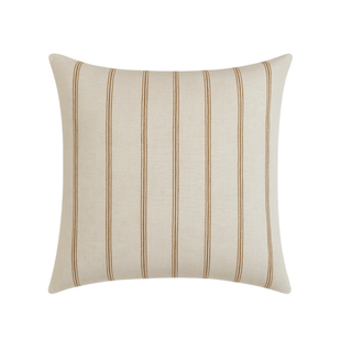 Striped pillow with beige and brown lines on a white background